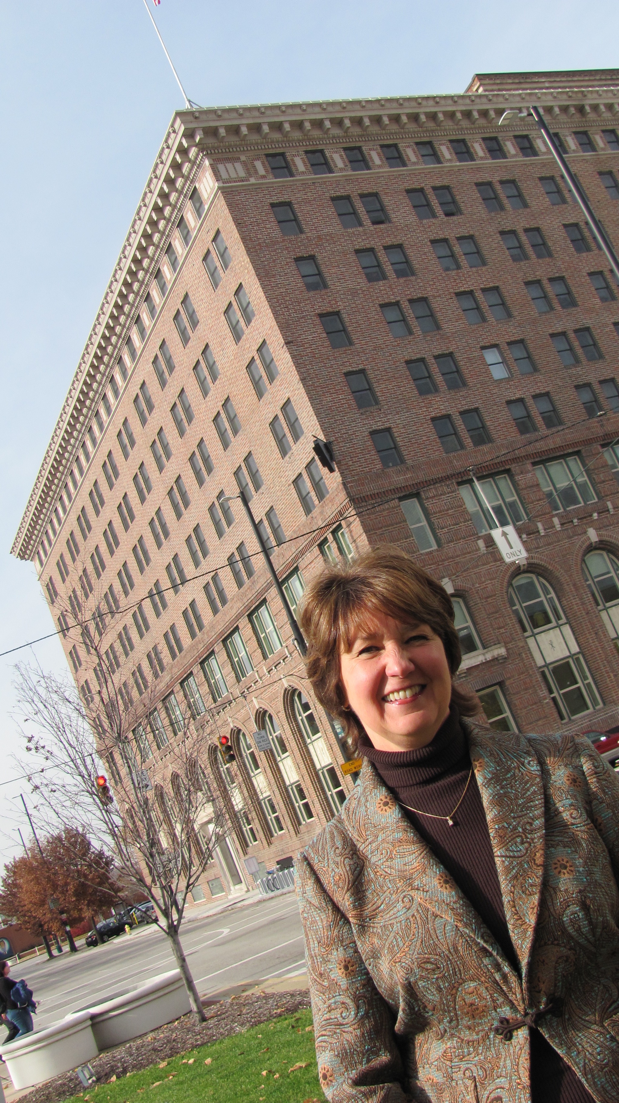 Kathy Lind-Ison, vice president of affordable living for Episcopal Retirement Services (ERS) in front of Central Parkway Place, built inside the Central Parkway YMCA in downtown Cincinnati.
