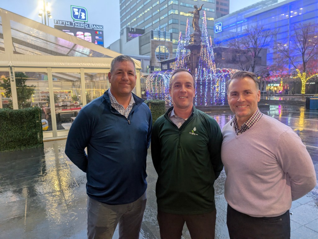 Rosselot Financial CEO Nate Kosman with his partner, Rosselot CFO Ryan Antepenko (center), join Rob Blevins (right) of Merchant Investment Management.